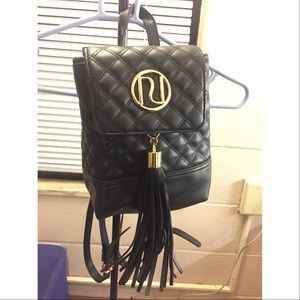 Black leather River Island backpack. Like new